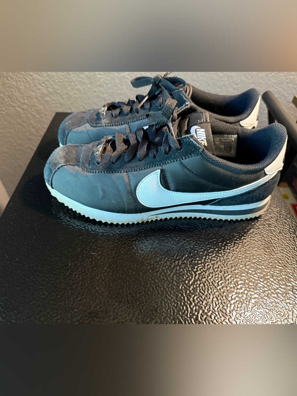 Nike women’s Cortez Black Sneakers with white Swoosh